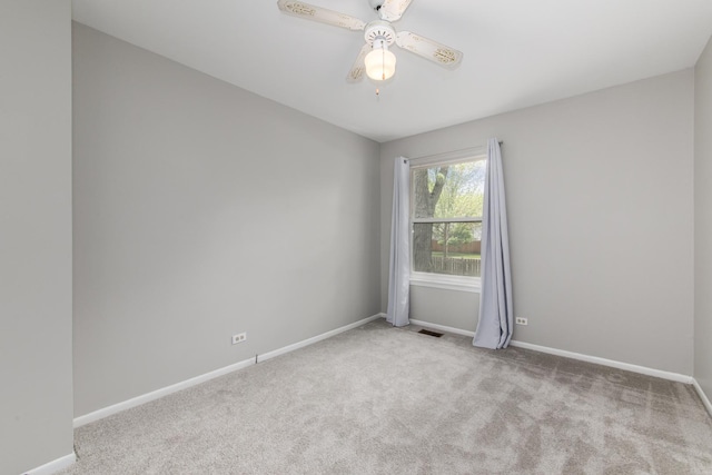2060 Navarone Dr, Naperville, IL 60565 - carpeted empty room featuring baseboards and a ceiling fan
