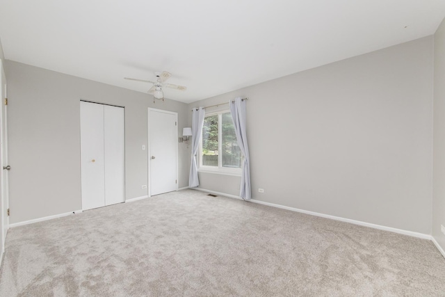 2060 Navarone Dr, Naperville, IL 60565 - unfurnished bedroom featuring carpet flooring, a ceiling fan, and a closet