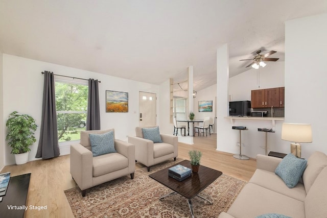2060 Navarone Dr, Naperville, IL 60565 - living room with light wood finished floors, lofted ceiling, and ceiling fan