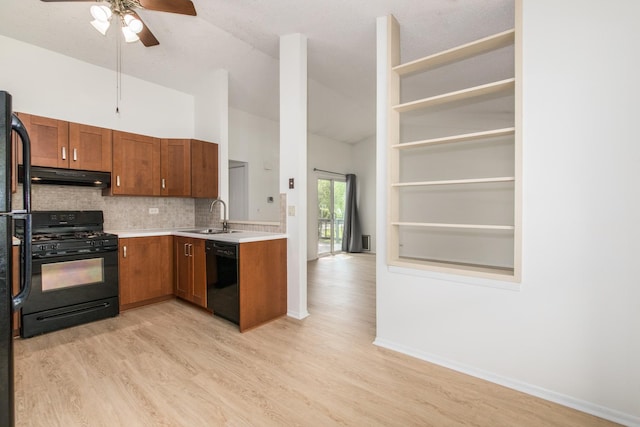 2060 Navarone Dr, Naperville, IL 60565 - kitchen with black appliances, under cabinet range hood, light wood-type flooring, light countertops, and decorative backsplash