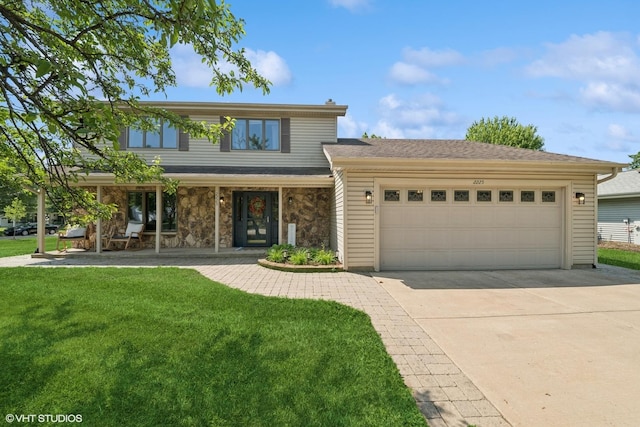 2225 W Weathersfield Way, Schaumburg, IL 60193 - view of front of home with a front yard, a garage, driveway, a porch, and stone siding