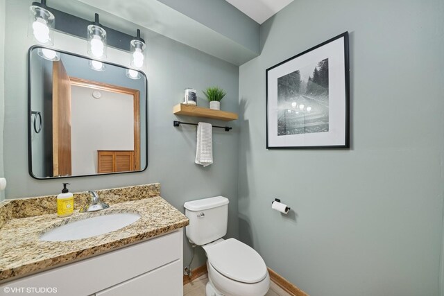 2225 W Weathersfield Way, Schaumburg, IL 60193 - half bathroom featuring toilet and vanity
