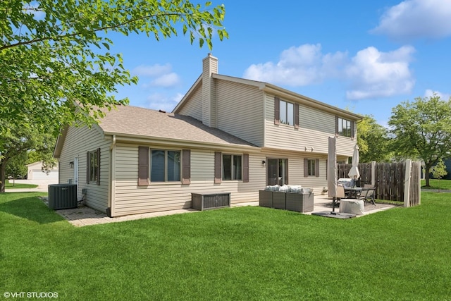 2225 W Weathersfield Way, Schaumburg, IL 60193 - back of house featuring a chimney, outdoor lounge area, a patio, and a shingled roof