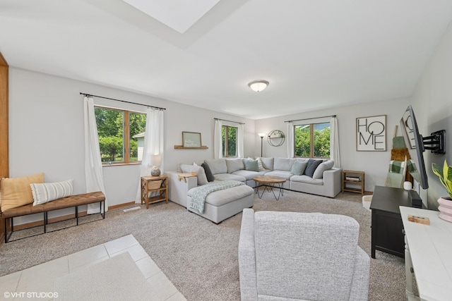 2225 W Weathersfield Way, Schaumburg, IL 60193 - living room featuring a skylight and light tile patterned floors