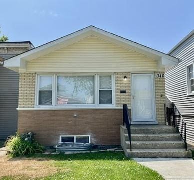 1340 Wesley Ave, Berwyn, IL 60402 - view of front of house featuring brick siding and a front yard