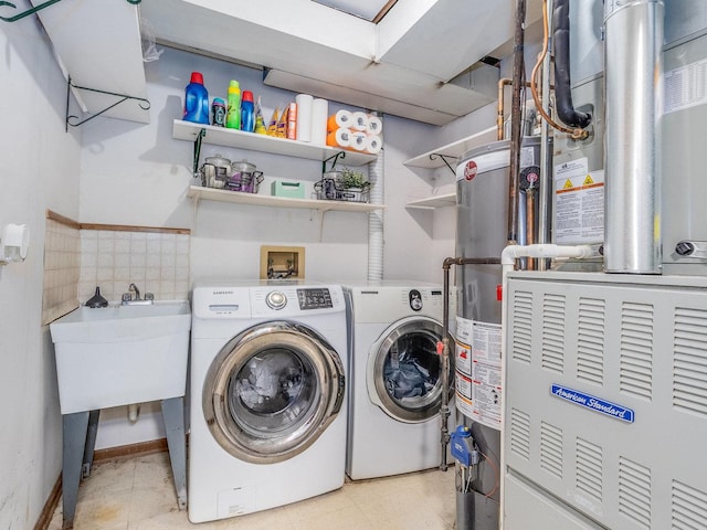 2326 Olde Mill Rd, Plainfield, IL 60586 - laundry area featuring washer and dryer, heating unit, and gas water heater