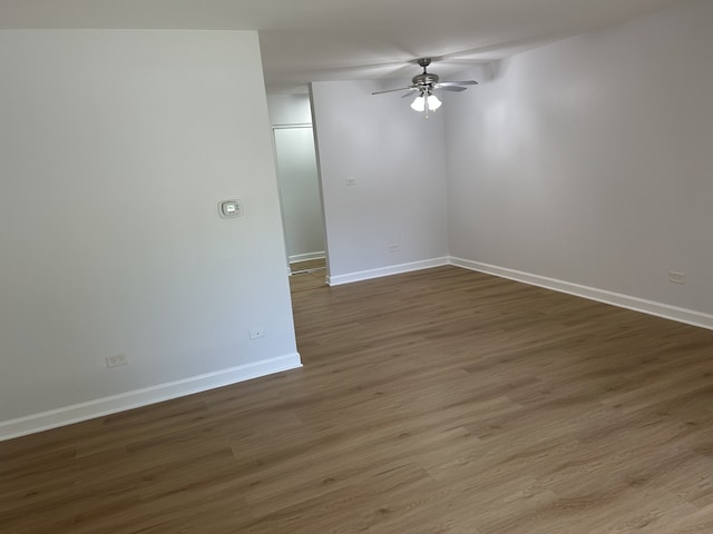 2426 N Kennicott Ave Unit 1D, Arlington Heights, IL 60004 - empty room with a ceiling fan and wood finished floors
