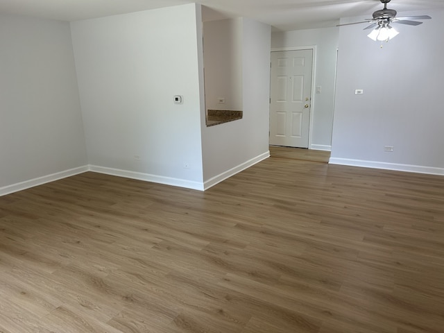 2426 N Kennicott Ave Unit 1D, Arlington Heights, IL 60004 - spare room with a ceiling fan and wood finished floors