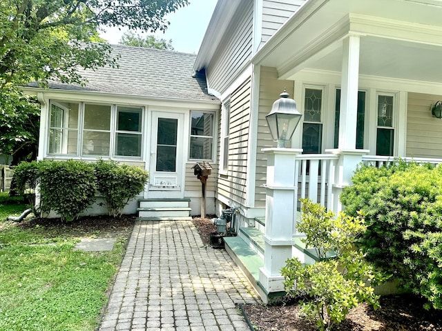 316 N Worth Ave, Elgin, IL 60123 - doorway to property with a shingled roof