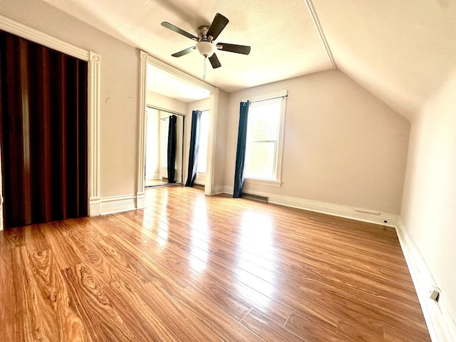 316 N Worth Ave, Elgin, IL 60123 - unfurnished room with wood finished floors, a ceiling fan, and vaulted ceiling