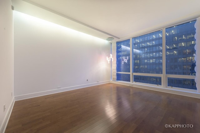 401 N Wabash Ave Unit 39G, Chicago, IL 60611 - spare room featuring wood finished floors and baseboards
