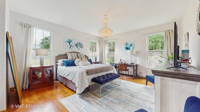 301 W Eagle Ct, Waukegan, IL 60087 - bedroom with light wood-style flooring