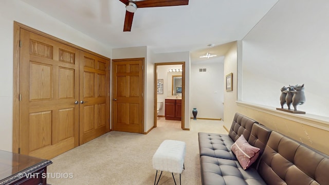 301 W Eagle Ct, Waukegan, IL 60087 - living area featuring light colored carpet and baseboards