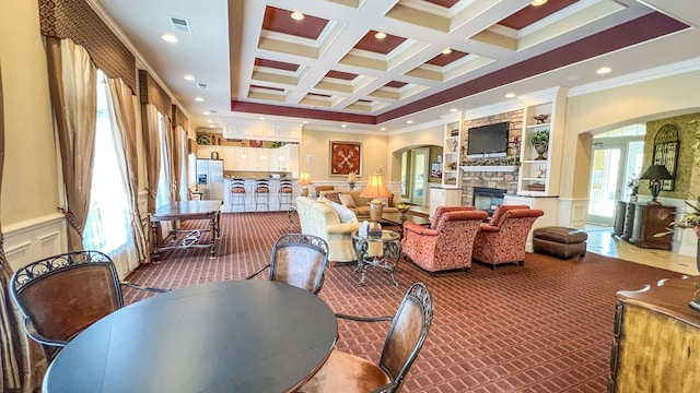 301 W Eagle Ct, Waukegan, IL 60087 - dining room featuring arched walkways, crown molding, coffered ceiling, carpet floors, and beam ceiling