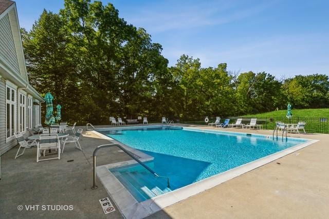 301 W Eagle Ct, Waukegan, IL 60087 - community pool featuring a patio area