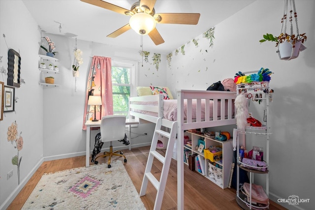 2945 Worcester Ln, Aurora, IL 60504 - bedroom featuring wood finished floors, a desk, and ceiling fan
