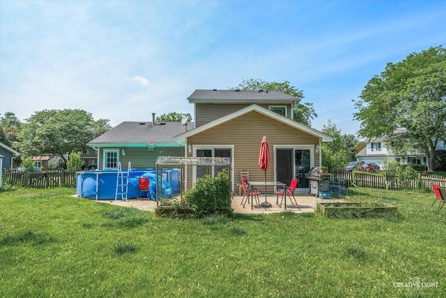 2945 Worcester Ln, Aurora, IL 60504 - rear view of house featuring a fenced backyard and a patio area