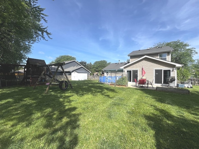 2945 Worcester Ln, Aurora, IL 60504 - view of yard featuring a playground and a patio area