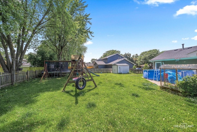 2945 Worcester Ln, Aurora, IL 60504 - fenced backyard with a playground, a storage unit, and a trampoline