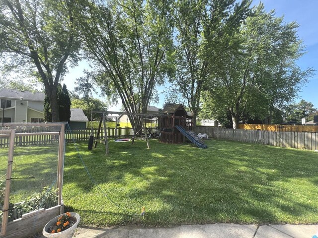 2945 Worcester Ln, Aurora, IL 60504 - fenced backyard featuring a playground