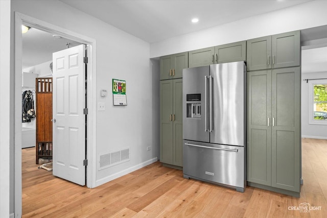 2945 Worcester Ln, Aurora, IL 60504 - kitchen featuring green cabinets, high end refrigerator, light wood-type flooring, and recessed lighting