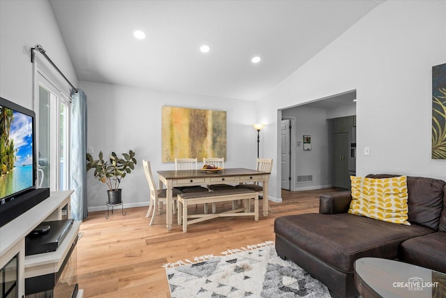 2945 Worcester Ln, Aurora, IL 60504 - living room featuring light wood-style floors, recessed lighting, and high vaulted ceiling