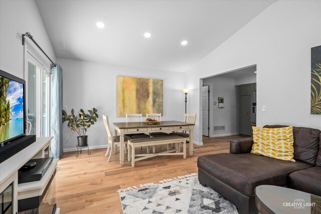 2945 Worcester Ln, Aurora, IL 60504 - living room with light wood-type flooring, recessed lighting, and high vaulted ceiling