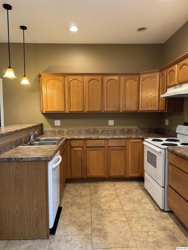 1422 N 3rd, Quincy, IL 62301 - kitchen with white appliances, under cabinet range hood, brown cabinetry, dark countertops, and pendant lighting