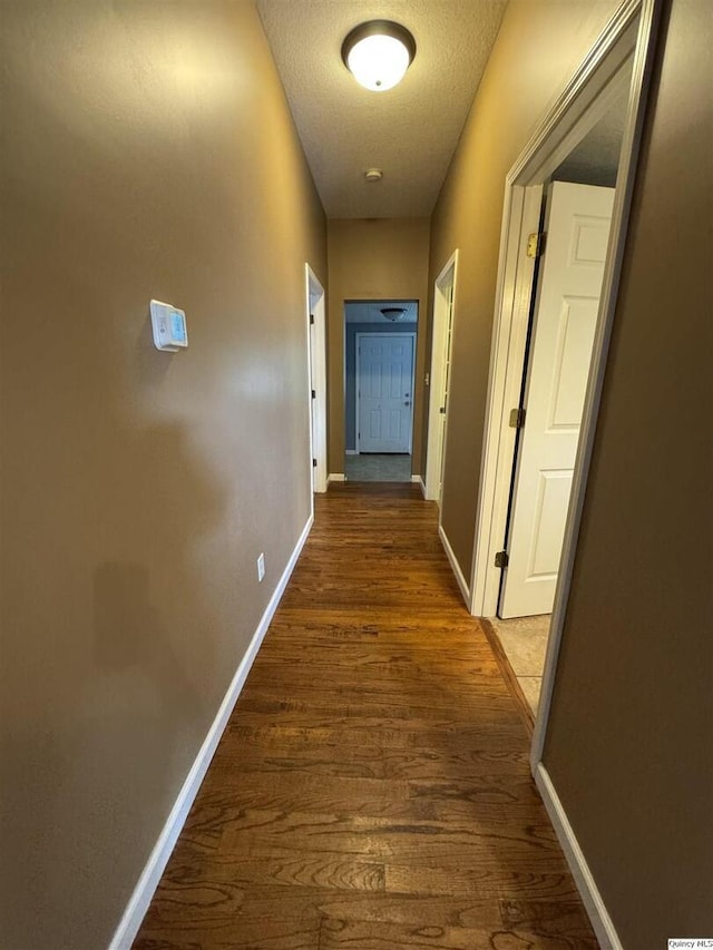 1422 N 3rd, Quincy, IL 62301 - hall with wood finished floors and a textured ceiling