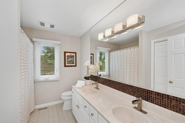 21705 W Hilandale Ct, Kildeer, IL 60047 - full bathroom featuring double vanity, plenty of natural light, tile patterned flooring, and a shower with curtain
