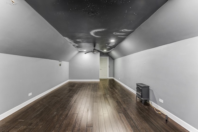 7125 S Sangamon St, Chicago, IL 60621 - bonus room featuring ceiling fan, hardwood / wood-style floors, a wood stove, and lofted ceiling