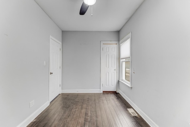 7125 S Sangamon St, Chicago, IL 60621 - empty room with dark wood finished floors and ceiling fan