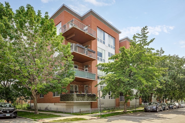 1825 N Winnebago Ave Unit 101, Chicago, IL 60647 - view of apartment building / complex