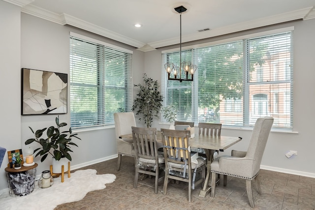 1825 N Winnebago Ave Unit 101, Chicago, IL 60647 - dining room with crown molding, plenty of natural light, a chandelier, and recessed lighting