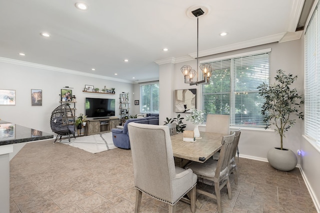 1825 N Winnebago Ave Unit 101, Chicago, IL 60647 - dining space featuring stone finish floors, a chandelier, recessed lighting, and crown molding