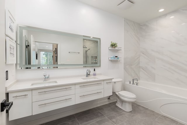 1825 N Winnebago Ave Unit 101, Chicago, IL 60647 - bathroom with double vanity, bathtub / shower combination, and tile patterned floors