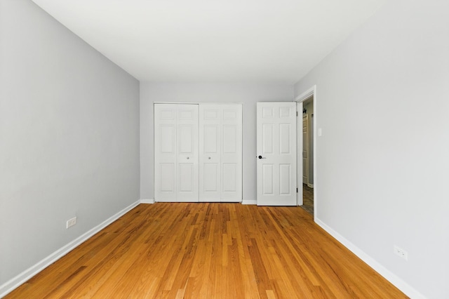 9516 S Kildare Ave Unit 3S, Oak Lawn, IL 60453 - unfurnished bedroom featuring light wood-style floors and a closet