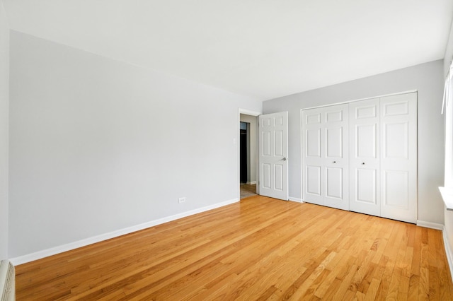 9516 S Kildare Ave Unit 3S, Oak Lawn, IL 60453 - unfurnished bedroom featuring light wood-type flooring and a closet