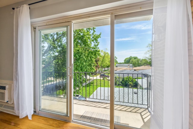 9516 S Kildare Ave Unit 3S, Oak Lawn, IL 60453 - doorway to outside with wood finished floors and cooling unit