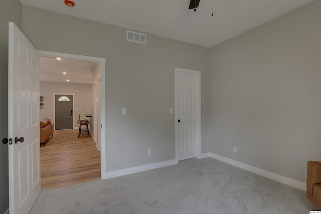 1418 N 6th, Quincy, IL 62301 - unfurnished bedroom featuring light colored carpet, recessed lighting, and ceiling fan