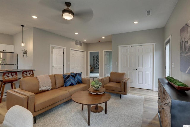 1418 N 6th, Quincy, IL 62301 - living area with light wood-type flooring, recessed lighting, and ceiling fan