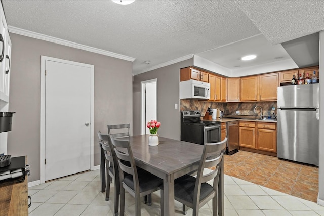 10622 Parkside Ave Unit 103, Chicago Ridge, IL 60415 - kitchen featuring appliances with stainless steel finishes, light tile patterned flooring, tasteful backsplash, crown molding, and brown cabinetry