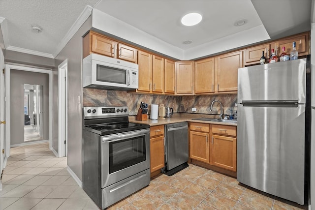10622 Parkside Ave Unit 103, Chicago Ridge, IL 60415 - kitchen with appliances with stainless steel finishes, tasteful backsplash, light countertops, crown molding, and light tile patterned flooring