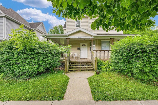 611 W White St, Champaign, IL 61820 - view of front of house featuring covered porch