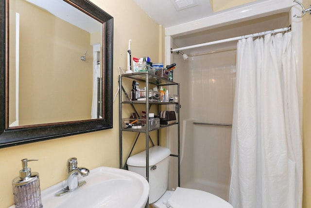 434C Woodview Rd Unit C, Lake Barrington, IL 60010 - bathroom featuring a sink and a shower with shower curtain