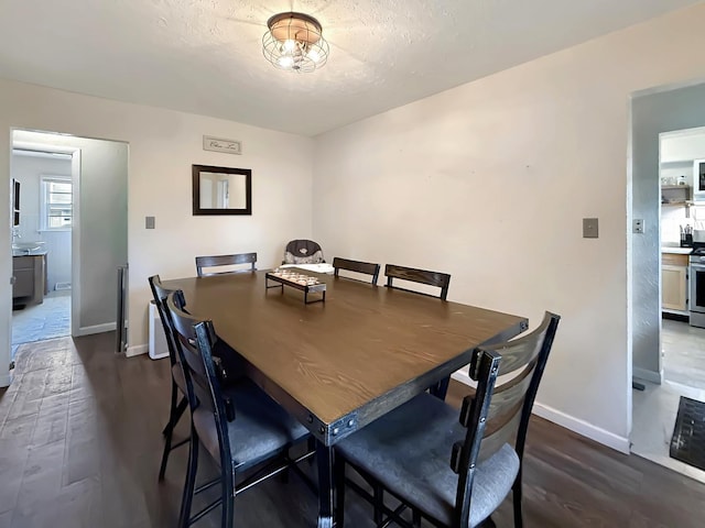 1639 S Highland Ave, Freeport, IL 61032 - dining area with wood finished floors and a textured ceiling