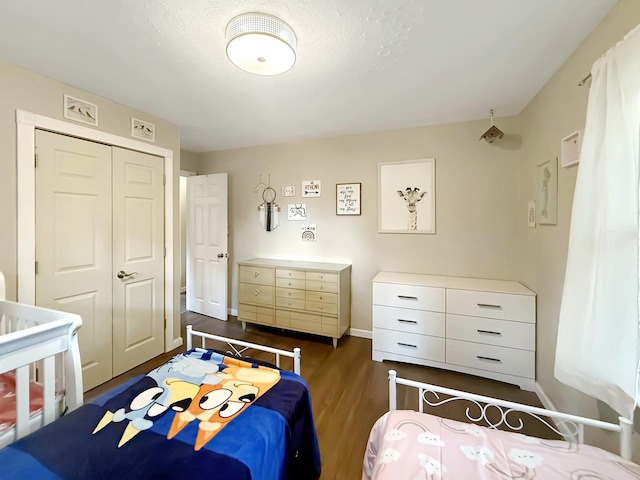 1639 S Highland Ave, Freeport, IL 61032 - bedroom featuring a closet and dark wood-style floors