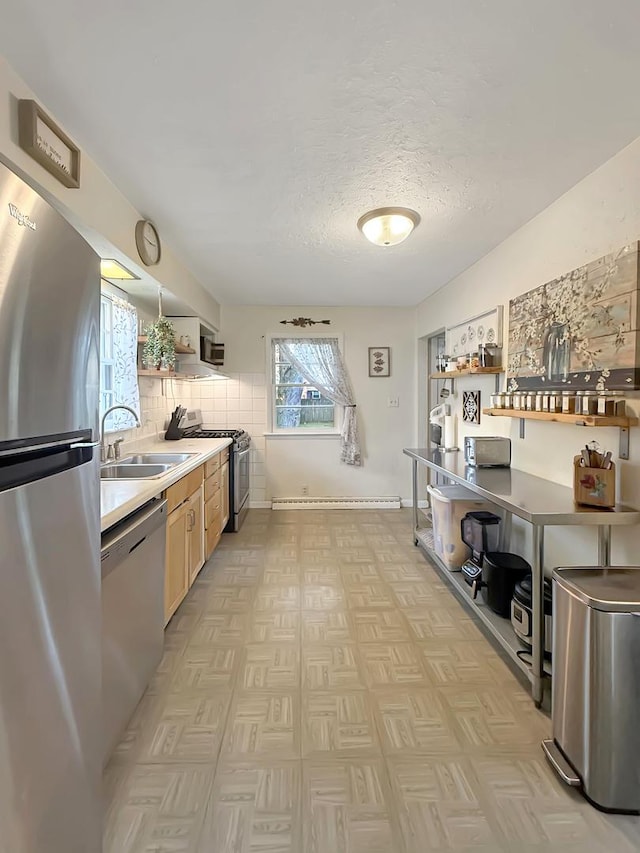 1639 S Highland Ave, Freeport, IL 61032 - kitchen with stainless steel appliances, open shelves, tasteful backsplash, a textured ceiling, and light countertops