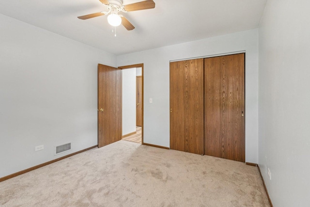 1228 N Lake Shore Dr, Round Lake Beach, IL 60073 - unfurnished bedroom with carpet floors, a closet, and a ceiling fan