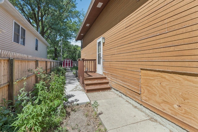 1228 N Lake Shore Dr, Round Lake Beach, IL 60073 - view of home's exterior with a storage unit
